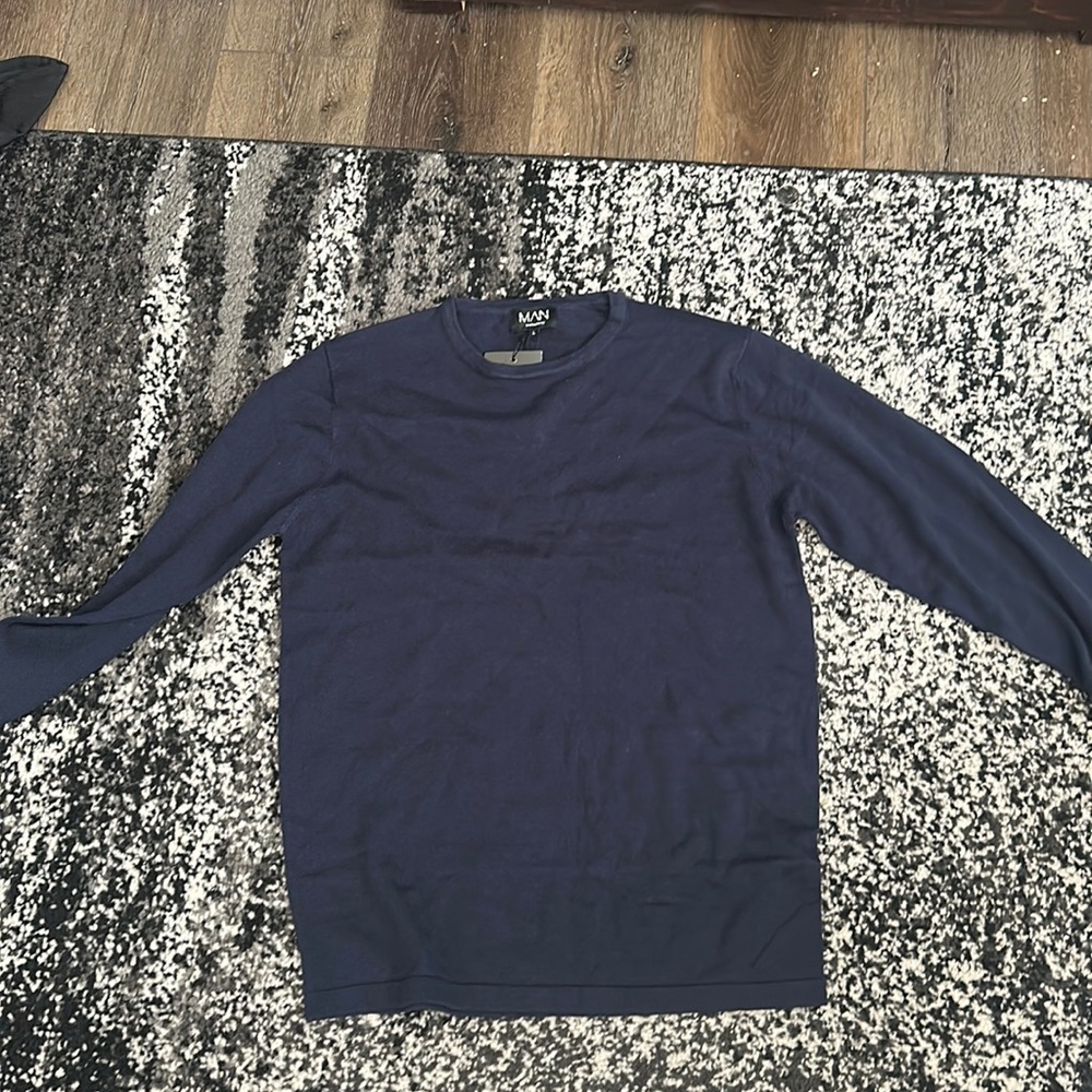 Blue sweater, casual setting